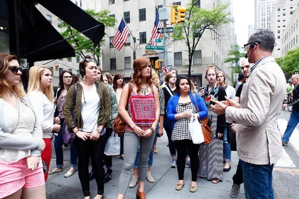 Licensed tour guide NYC leading a group of tourists
